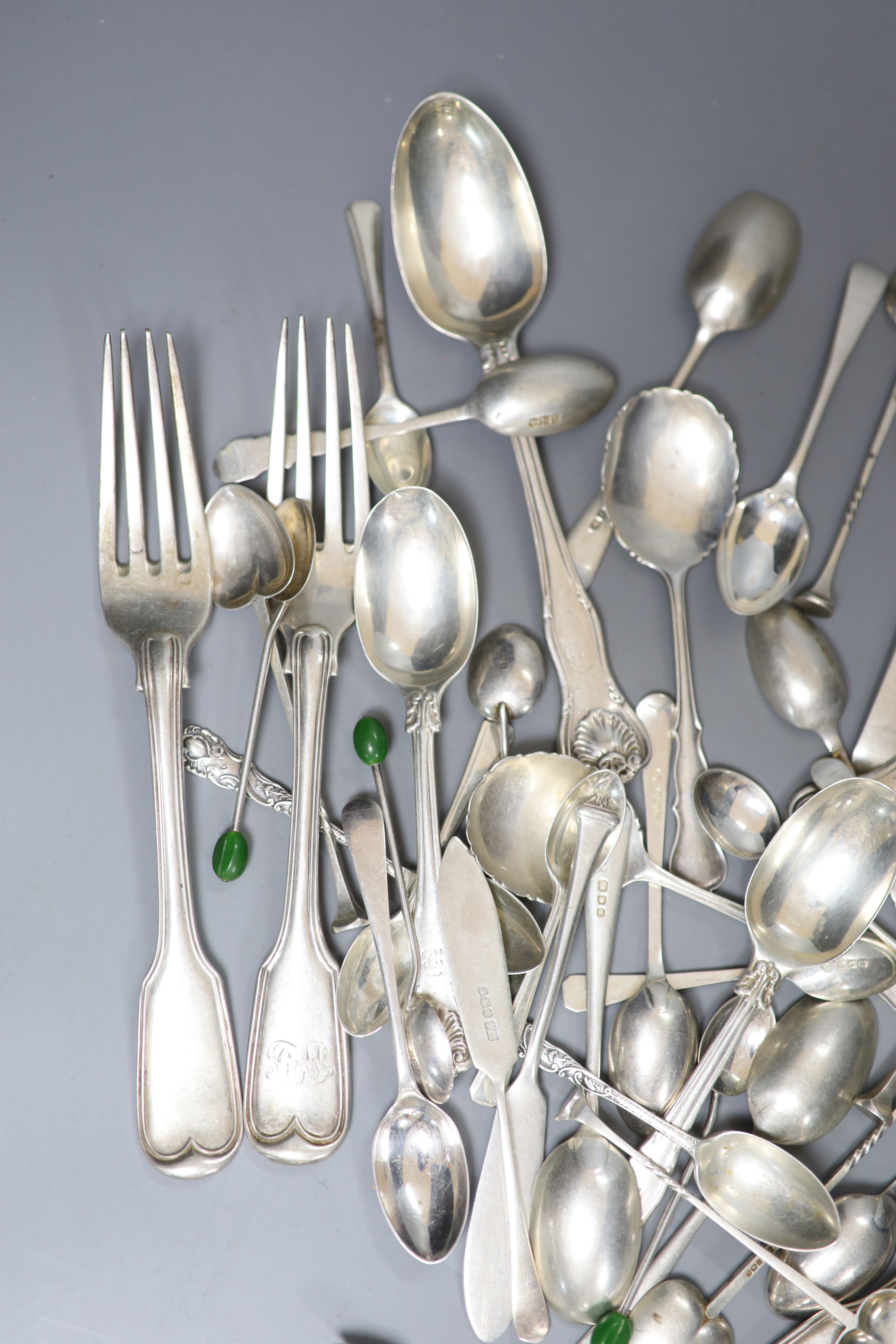 A quantity of assorted silver flatware including 19ct century table forks and dessert spoons and later teaspoons, coffee spoons etc
